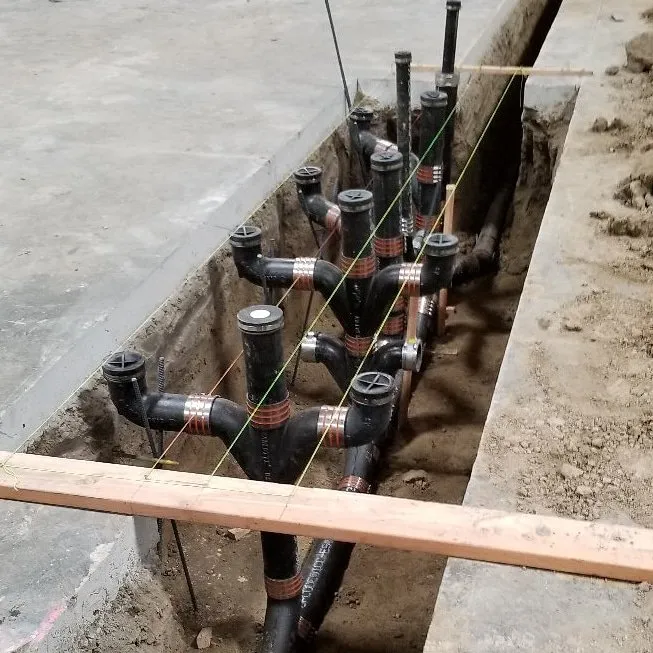 Underground drain piping arranged for a commercial installation